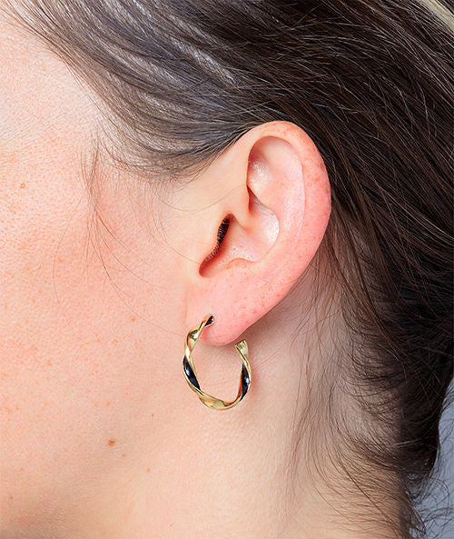 Princess GB two-tone twisted hoop earring