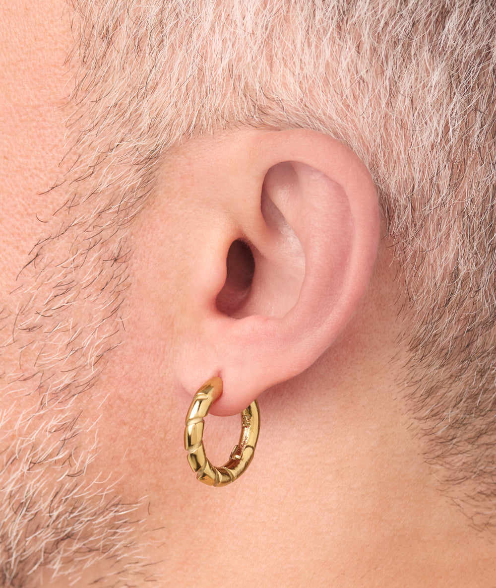 Silver creole earring, Willie S
