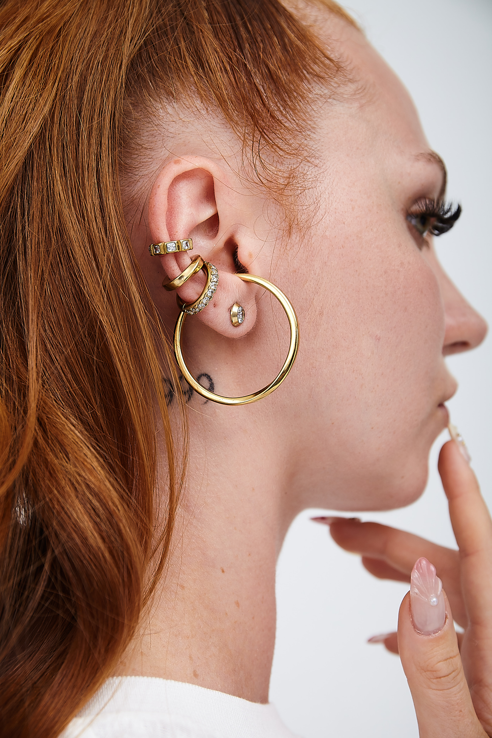 Carter G gold twist earring